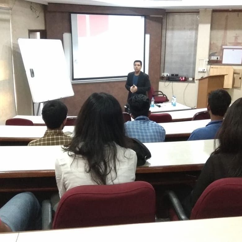 Nitin presenting in classroom setting